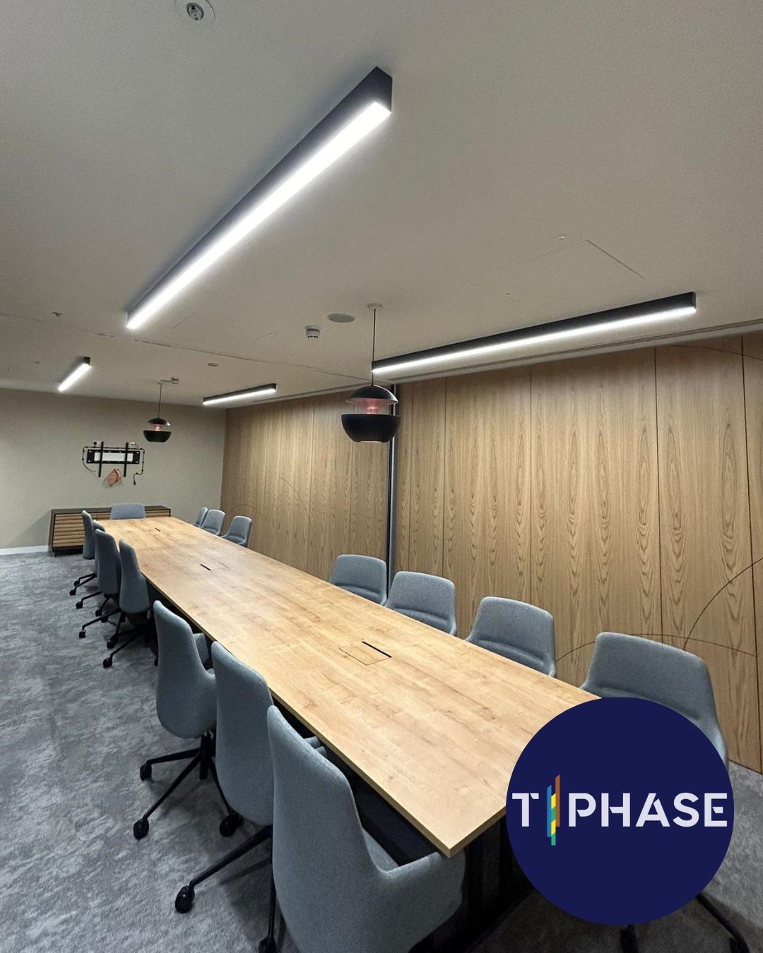 Office boardroom fit-out with linear feature lighting, City of London
